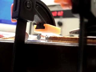 Coils and magnets (856 kByte video (http://vision.eng.shu.ac.uk/jan/MagneticActuation2.avi))