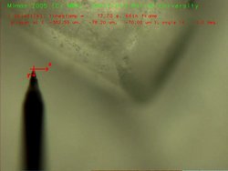 Automated tungsten tip approaching the piece of sugar (6.7 MByte video (http://vision.eng.shu.ac.uk/jan/sugarpush.avi))