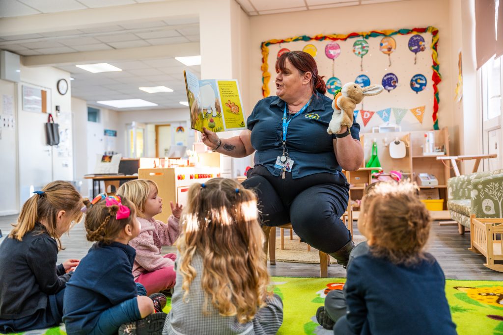 Teacher reading a TWiTCH story.