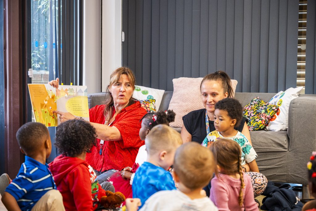 Teacher sharing a book in TWiTCH week 1.